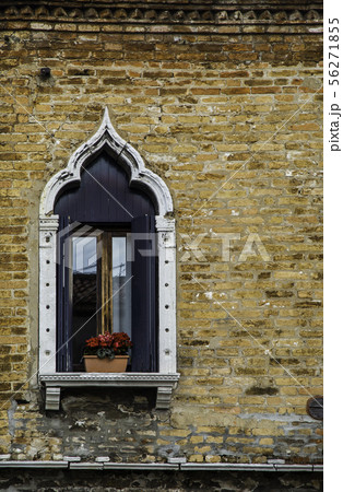 Detail of a window on a house in Murano island Detail of a window on a house in Murano island 56271855
