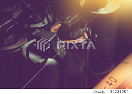 old hand grenades in box with dark background 56281504