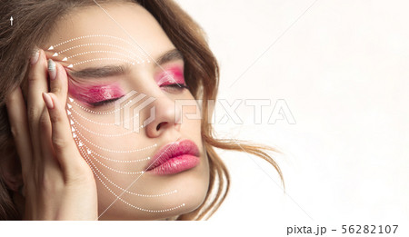 Beautiful female face, concept of skincare and lifting Beautiful female face, concept of skincare and lifting 56282107