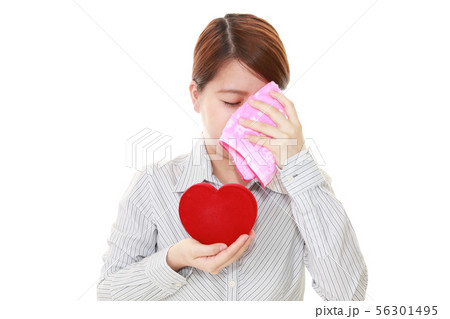 失恋をして泣く女性の写真素材