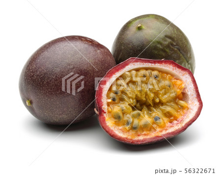 Whole and half passion fruits isolated on white 56322671
