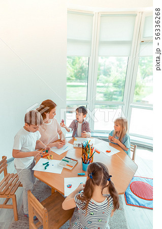 Happy talented children developing their creative skills Happy talented children developing their creative skills 56336268