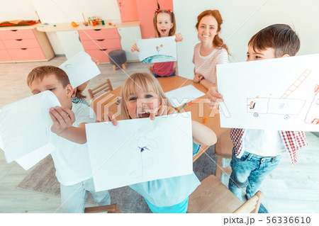 Top view of happy positive children with drawings 56336610