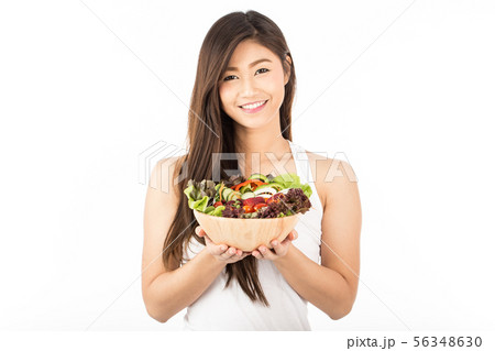 woman smile and holding fresh mix vegetables salad 56348630