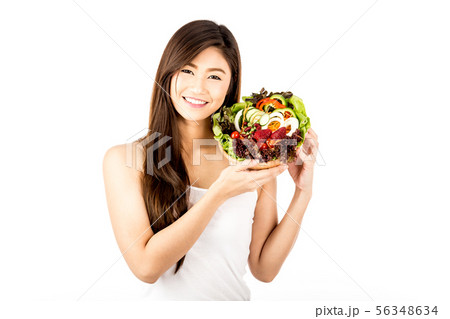 woman smile and holding fresh mix vegetables salad 56348634