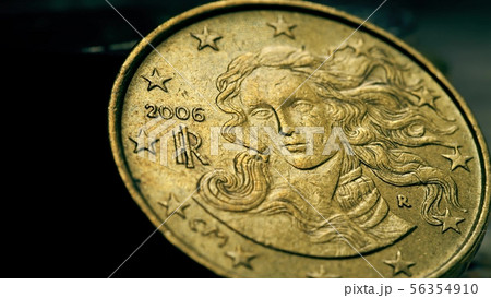 Detail of the famous Birth of Venus painting on Italian 10 Euro cents coin, macro shot 56354910