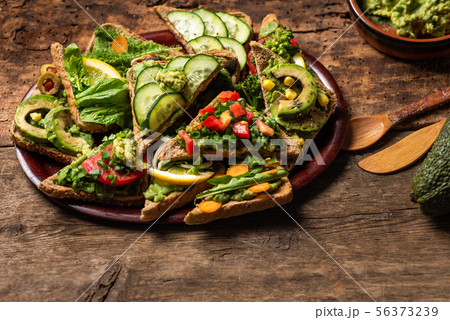 Vegetarian sandwiches with guacamole and 56373239