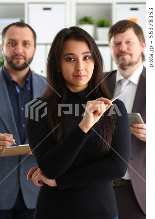 portrait of businesslady and two businessmen in office portrait of businesslady and two businessmen in office 56378353