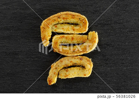 Savory cheese palmier on grey stone 56381026