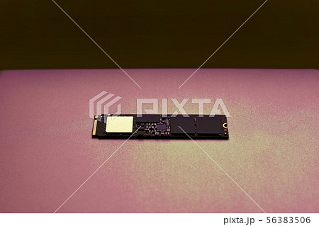 SSD drive, color correction in purple colors. 56383506