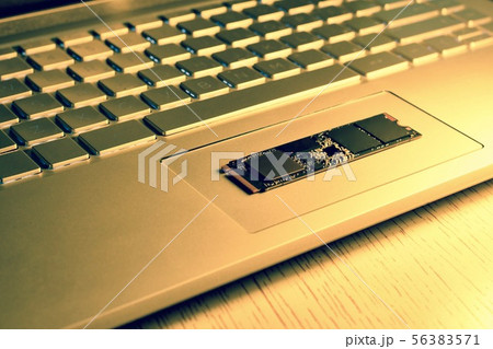 Chip SSD drive in the center of the laptop. Chip SSD drive in the center of the laptop. 56383571
