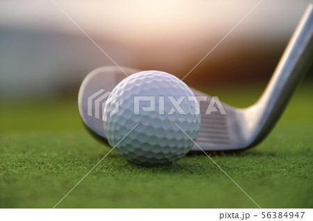 Golf ball and golf club in beautiful golf course a Golf ball and golf club in beautiful golf course a 56384947