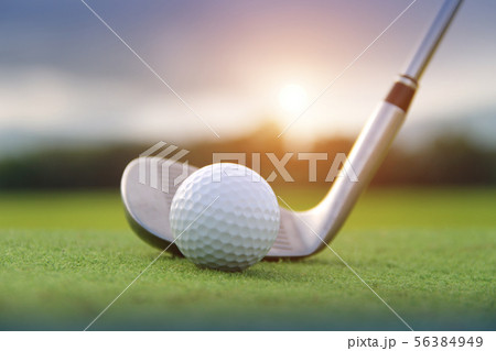 Golf ball and golf club in beautiful golf course a 56384949