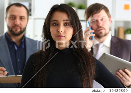 portrait of businesslady and two businessmen in office portrait of businesslady and two businessmen in office 56426390