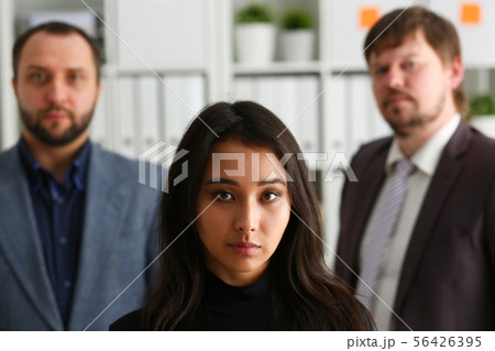 portrait of businesslady and two businessmen in office 56426395