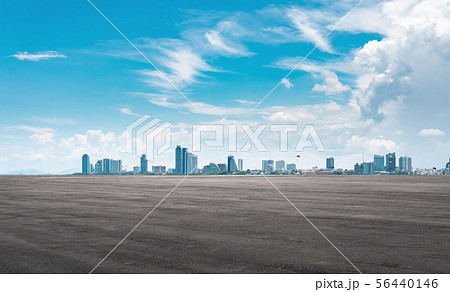 Abstract asphalt and city skyline backdrop 56440146