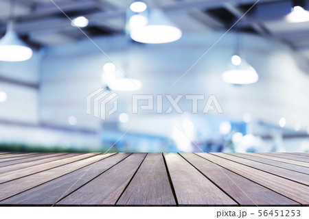 Wooden board with empty space and blurred cafe 56451253