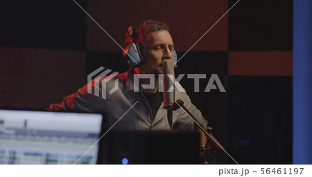 Actor doing voice over in sound studio Actor doing voice over in sound studio 56461197