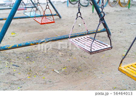 Old colorful swing. 56464013