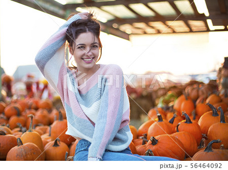Fashionable beautiful young girl at the autumn 56464092