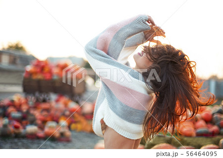 Fashionable beautiful young girl at the autumn 56464095