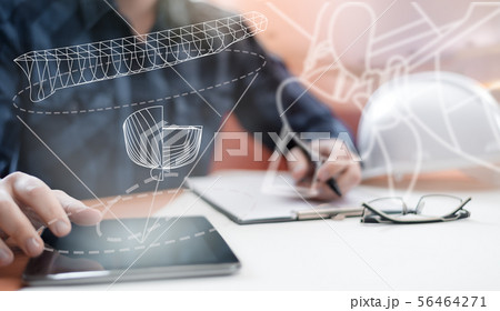 Young blurred sub-designer sitting in the office Young blurred sub-designer sitting in the office 56464271