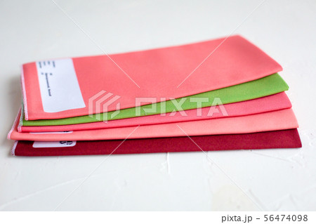 A Group of red palete Fabric on white 56474098