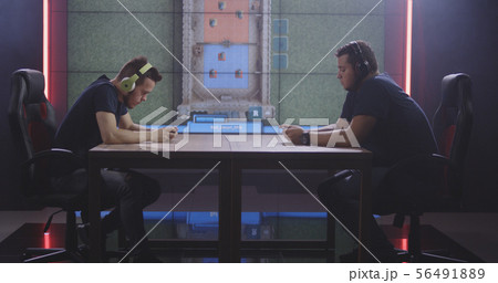 Two men playing mobile game at a tournament 56491889