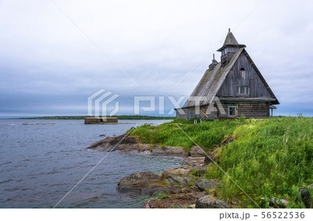 Beautiful landscape with a wooden chapel on the Beautiful landscape with a wooden chapel on the 56522536