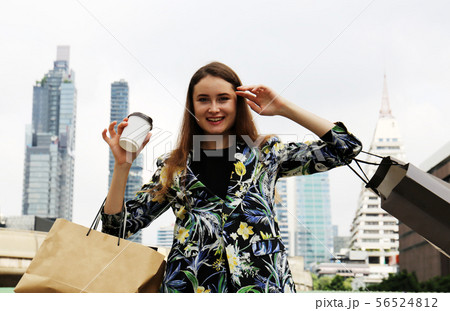 Beautiful woman business shopping in the city. Beautiful woman business shopping in the city. 56524812