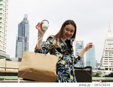 Beautiful woman business shopping in the city. Beautiful woman business shopping in the city. 56524816
