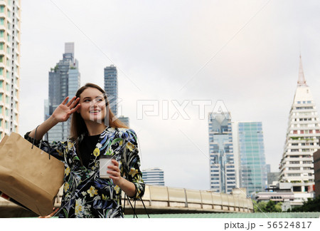 Beautiful woman business shopping in the city. Beautiful woman business shopping in the city. 56524817
