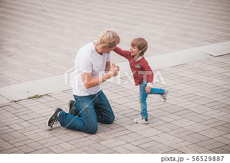 Father playing with his little son Father playing with his little son 56529887