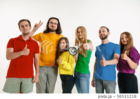 Young people weared in LGBT flag colors isolated on white background, LGBT pride concept 56531219
