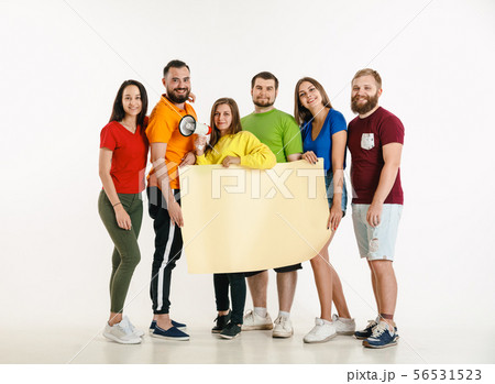Young people weared in LGBT flag colors isolated on white background, LGBT pride concept 56531523