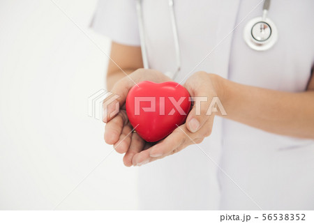 Nurses use hands to show heart shape concept Nurses use hands to show heart shape concept 56538352