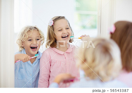 Child brushing teeth. Kids with toothpaste, brush. Child brushing teeth. Kids with toothpaste, brush. 56543387