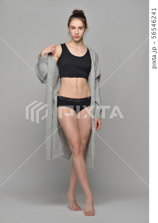 beautiful barefoot woman in underwear and grey beautiful barefoot woman in underwear and grey 56546241