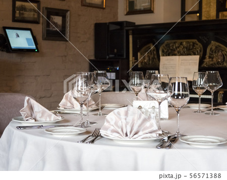 Empty wine glasses are served on the table Empty wine glasses are served on the table 56571388