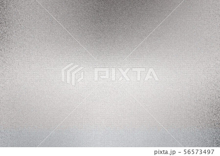 Glowing silver foil metallic sheet with scratched 56573497