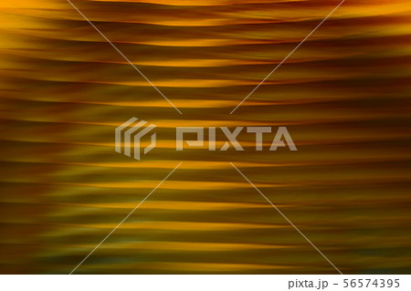 Abstract blurred background.Gold lines and curves. 56574395