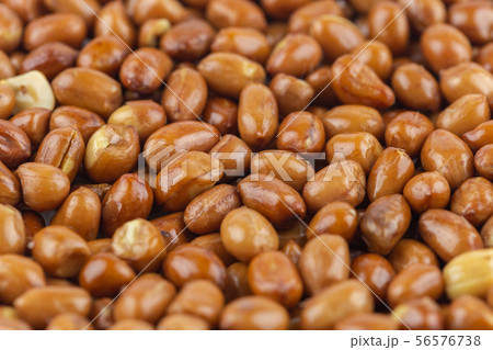 close-up peanut pile texture background. close-up peanut pile texture background. 56576738