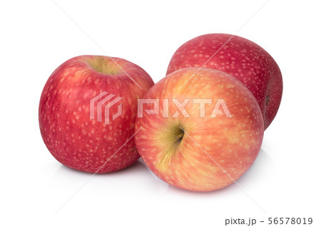 写真素材: three whole pink lady apple isolated
