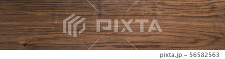 Black walnut wood texture of solid board oil finished Black walnut wood texture of solid board oil finished 56582563