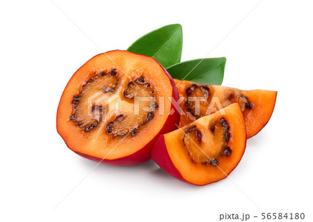 Fresh tamarillo half fruit with leaves isolated on white background 56584180
