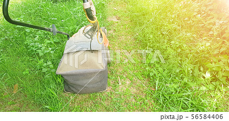 Car electric lawnmower. For cutting grass in the Car electric lawnmower. For cutting grass in the 56584406
