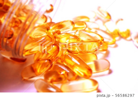 Fish oil supplement capsules  on white - image  56586297