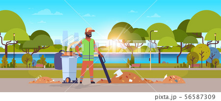 street janitor using industrial vacuum cleaner african american man in uniform vacuuming garbage in street janitor using industrial vacuum cleaner african american man in uniform vacuuming garbage in 56587309