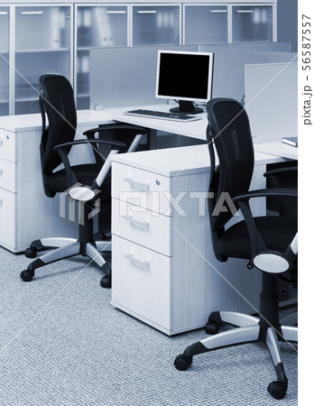 desks and chairs in modern office 56587557