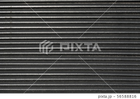 Flatlay of ribbed metal surface 56588816